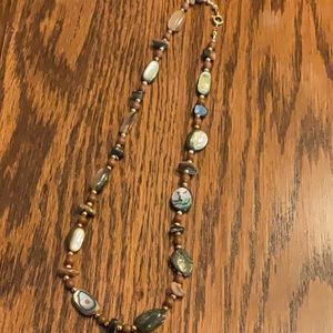18 inch necklace with a variety of polished stones and beads. Brand new!!